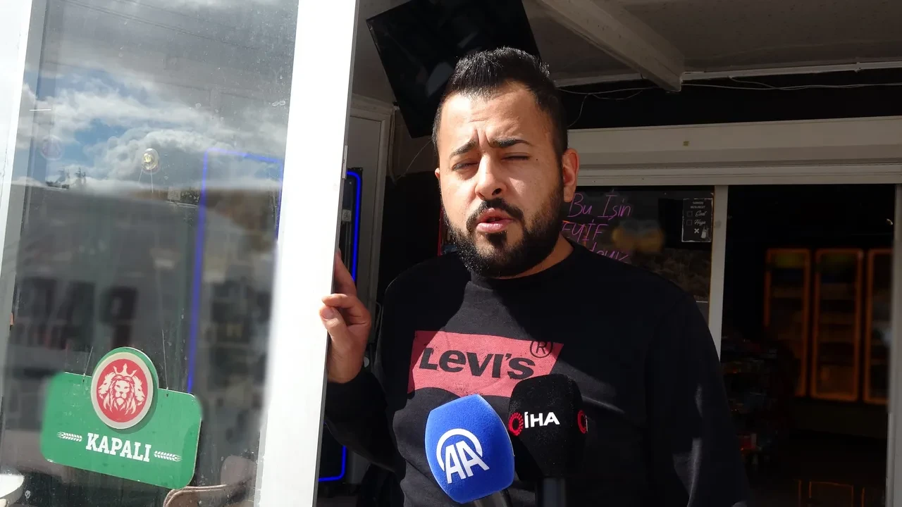 Burdur'da bir ilginç soygun! Taşla camı kırıp girdiği markette alem yaptı