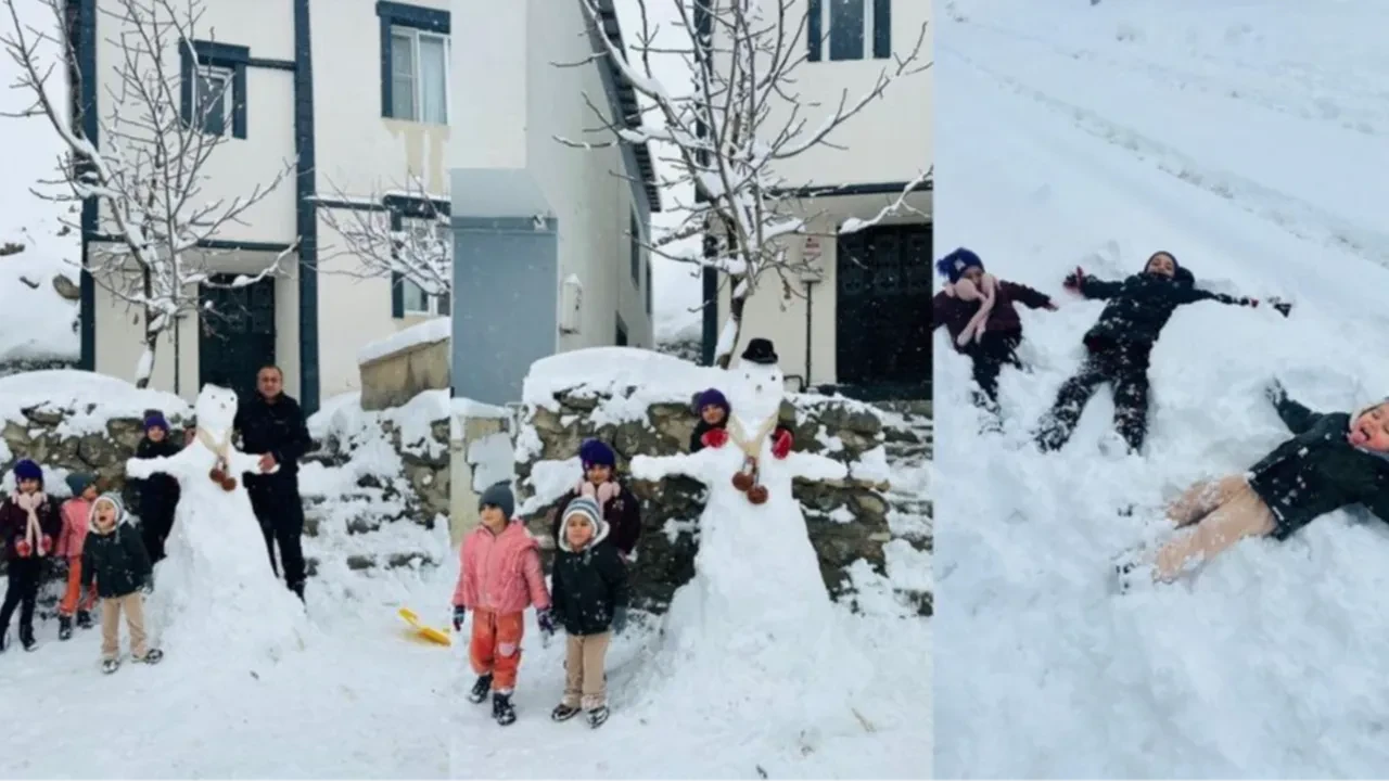 Hakkarili çocukların kardan adam sevinci