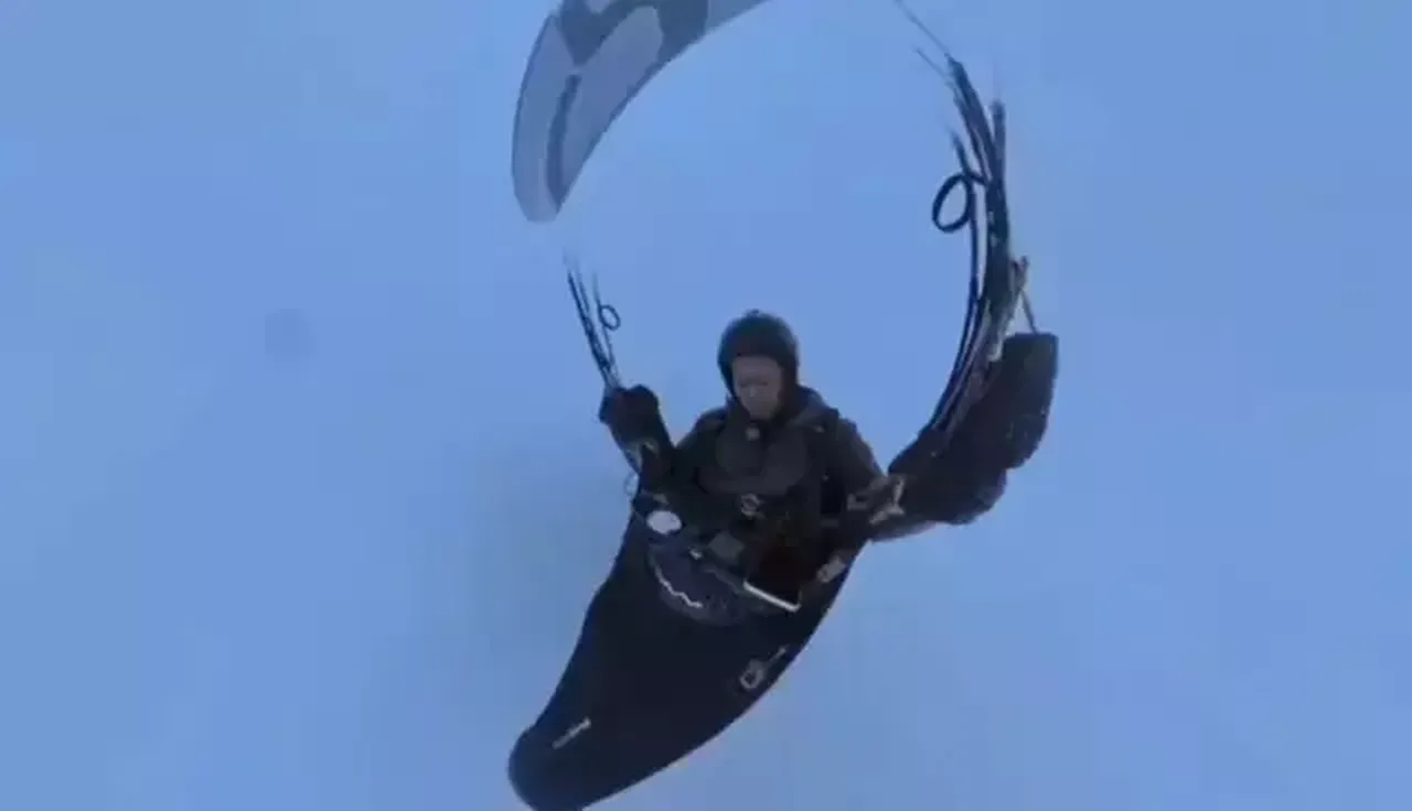 Hava akımı paraşütçüyü sivil hava sahasına sürükledi, donmaktan son anda kurtuldu
