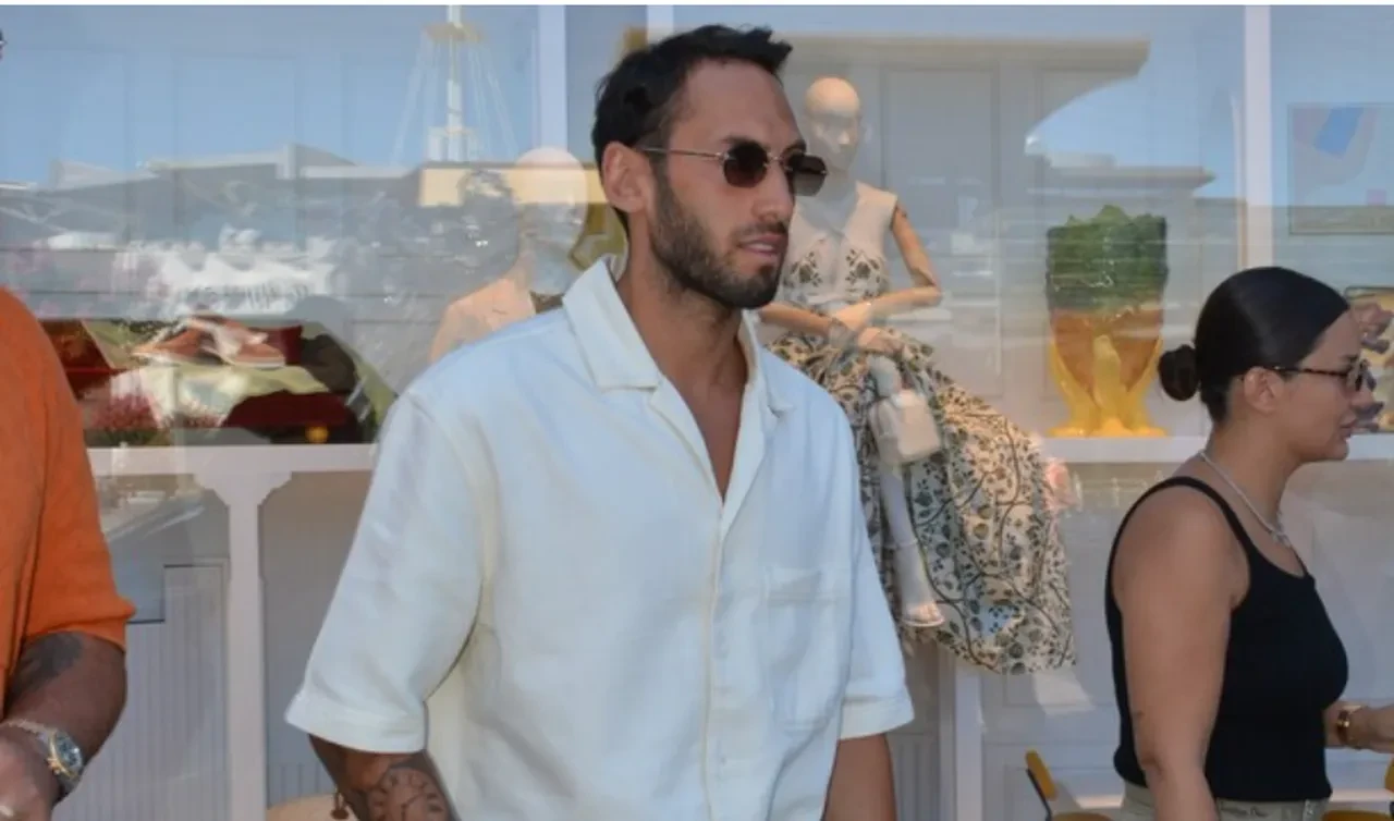 Hakan Çalhanoğlu ile eşi Sinem Çalhanoğlu İstanbul sokaklarında yürümekte zorlandı