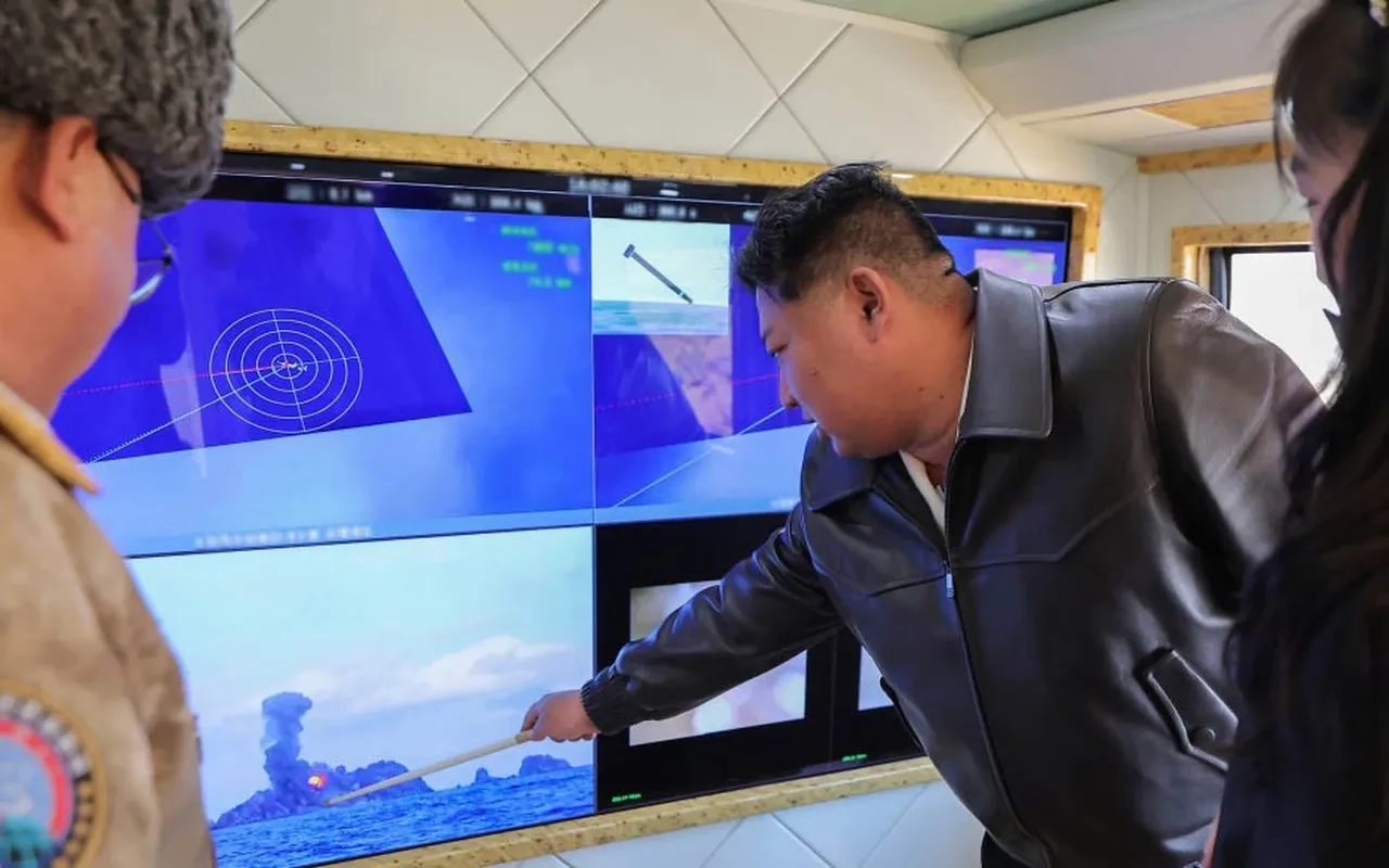 Kuzey Kore'den gövde gösterisi! Kim Jong-un öve öve bitiremedi: Büyük kalibreli çoklu roketatar sistemi test edildi