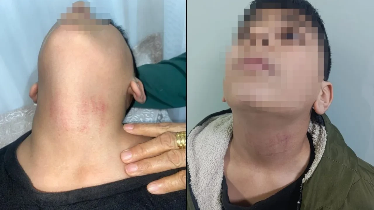 Bayrak rüzgardan düştü, memur çıldırdı: 10 yaşındaki çocuğu okulda darp etti