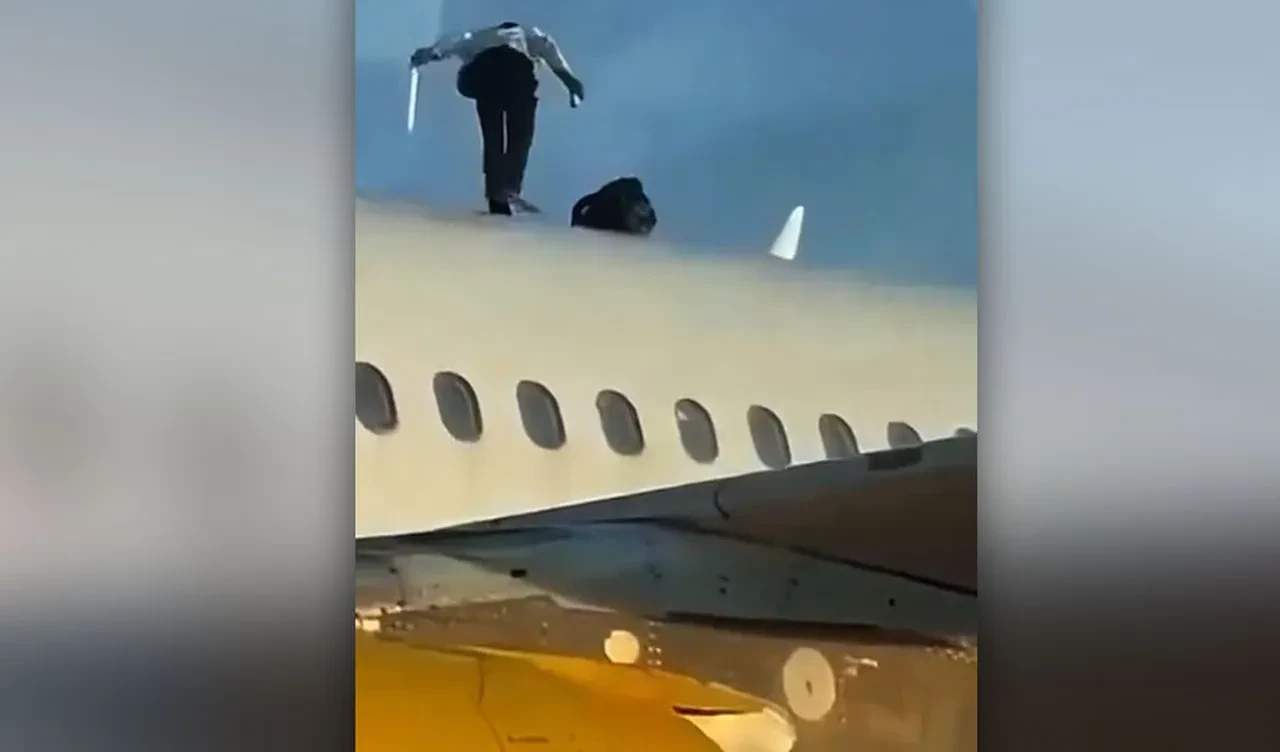 Uçağın üzerindeki adam herkesi çıldırttı, personelle adeta dalga geçti