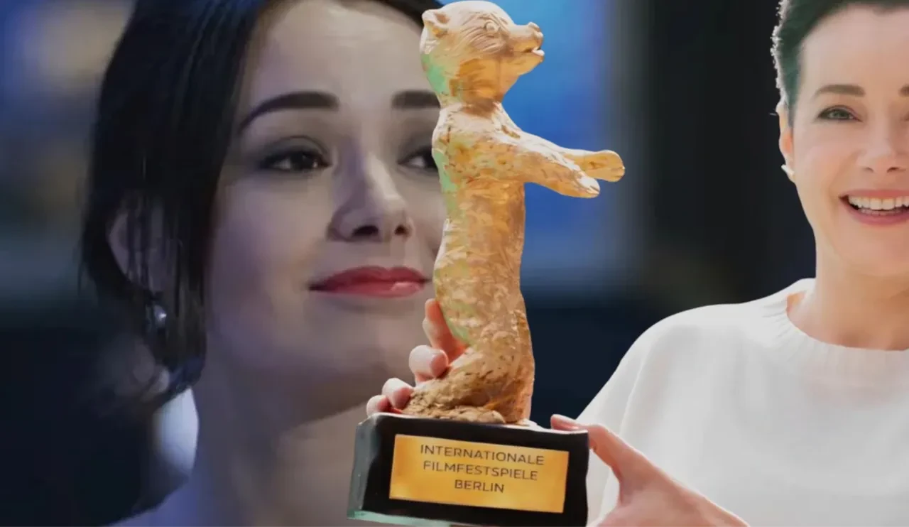 Berlin'den ödülle dönen Özgü Namal'a kıskanmak setinde sürpriz karşılama! Altın Ayı'lı pasta gururlandırdı