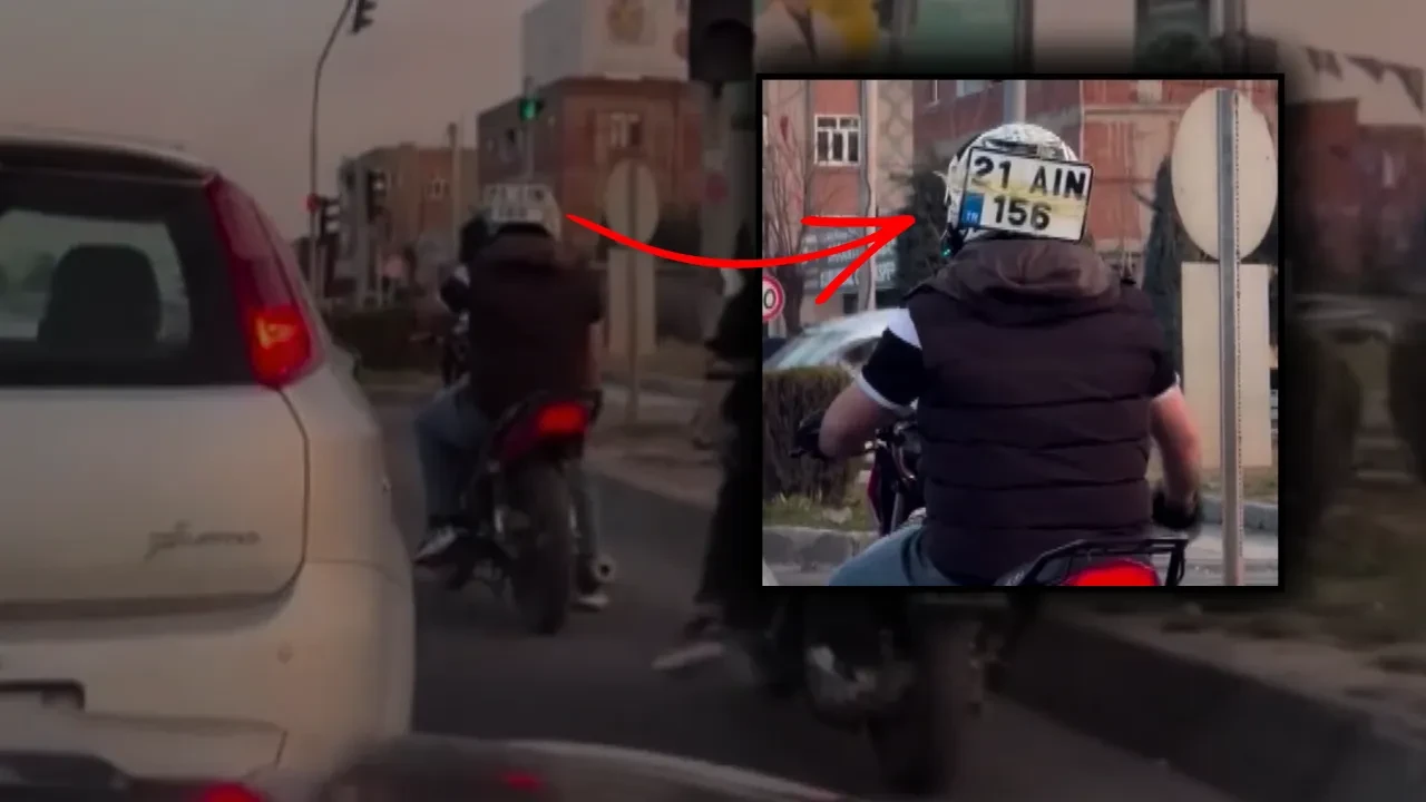 Diyarbakır’da güldüren görüntü: Düşen plakasını ceza yememek için kaskına bantladı