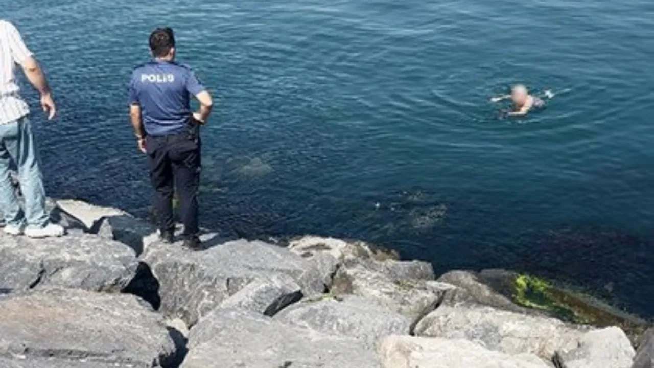 İntihara kalkıştı, ikna edildiği sırada ayağı kayınca denize düştü