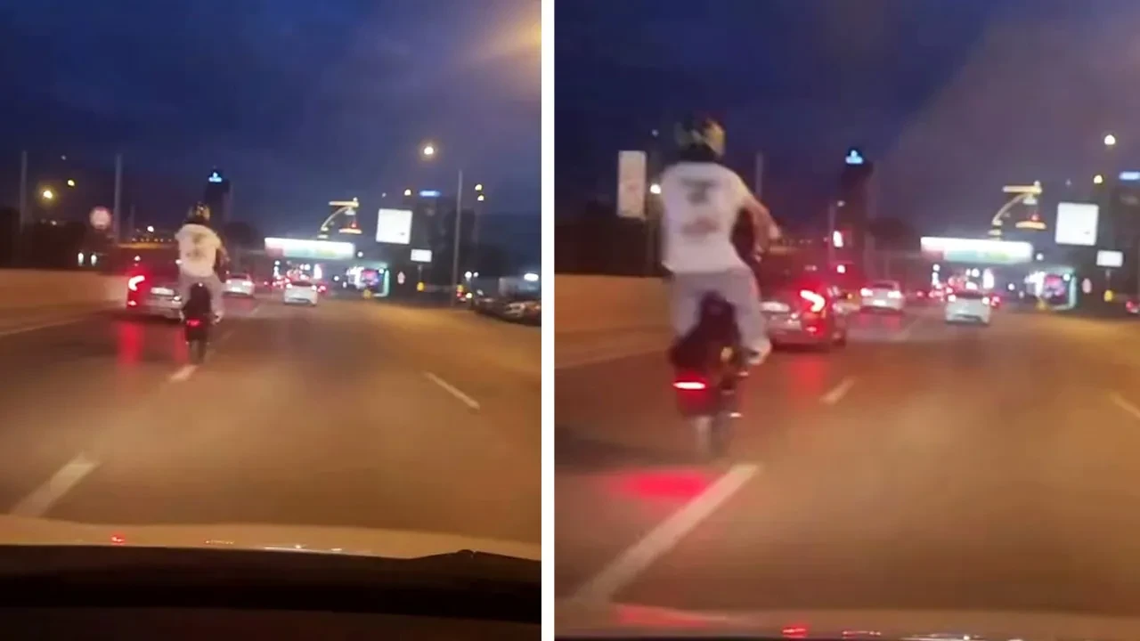 Trafikte tehlikeli anlar! Ön kaldırmaya çalışan motosikletli kamerada