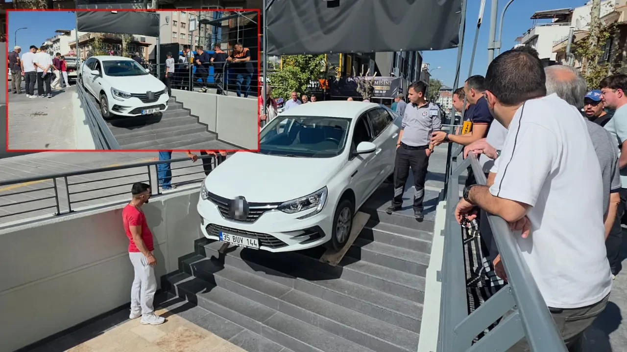 Kütahya’da ilginç kaza! Otomobil merdivenlerde asılı kaldı