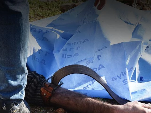 Koluna kemer bağlı halde ölü bulundu