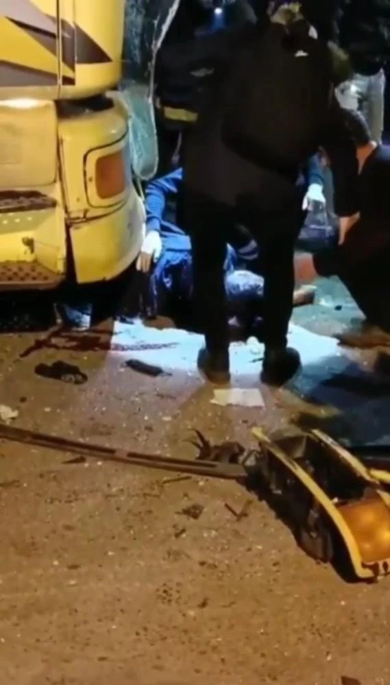 Kocasının kullandığı tırın altında kalan kadın ağır yaralandı