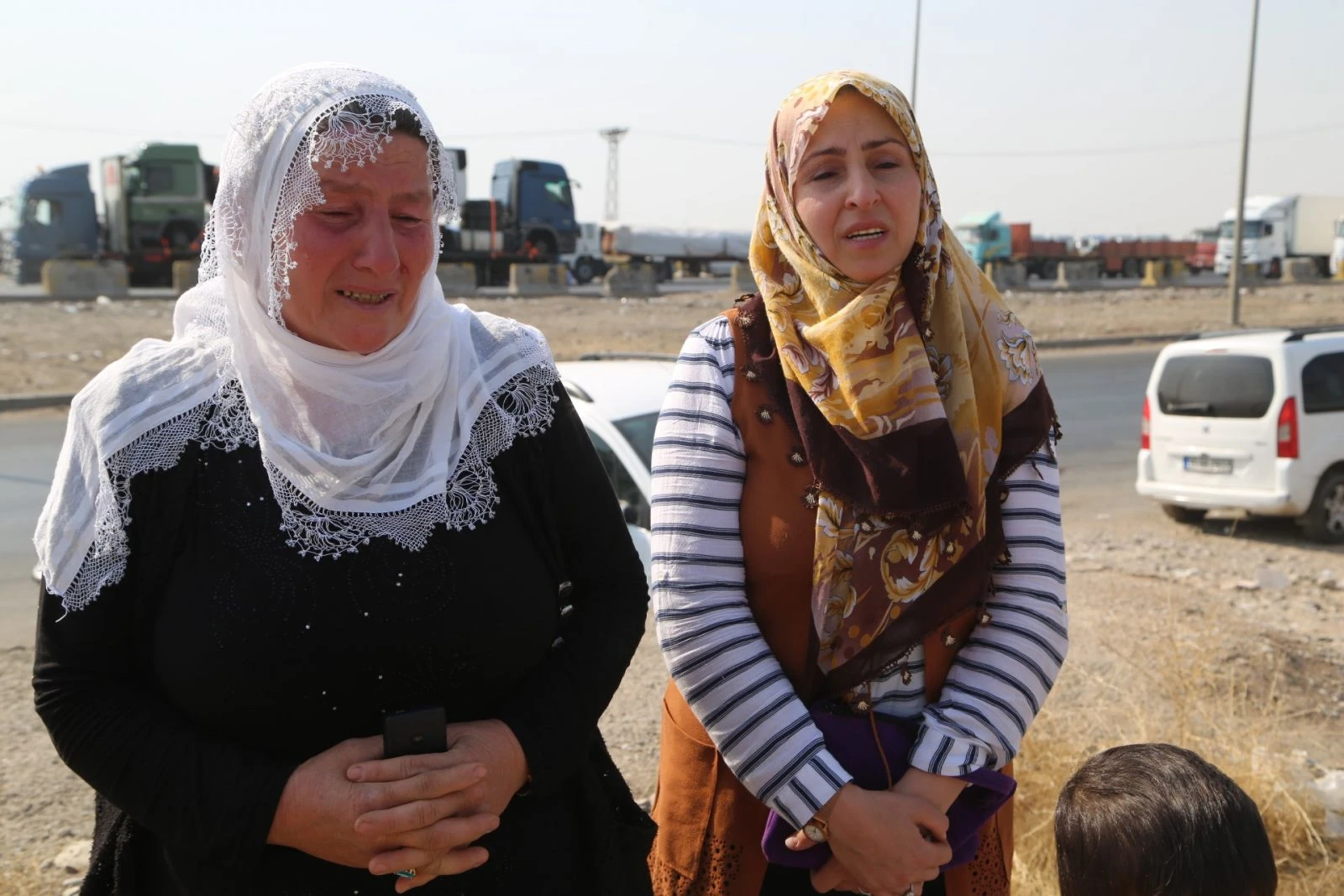 Peşmergenin elindeki genç ailesine kavuşmayı bekliyor