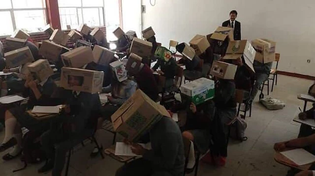 Öğretmenin kopya önlemi şaşırttı! Öğrencilerinin kafasına karton kutu geçirdi