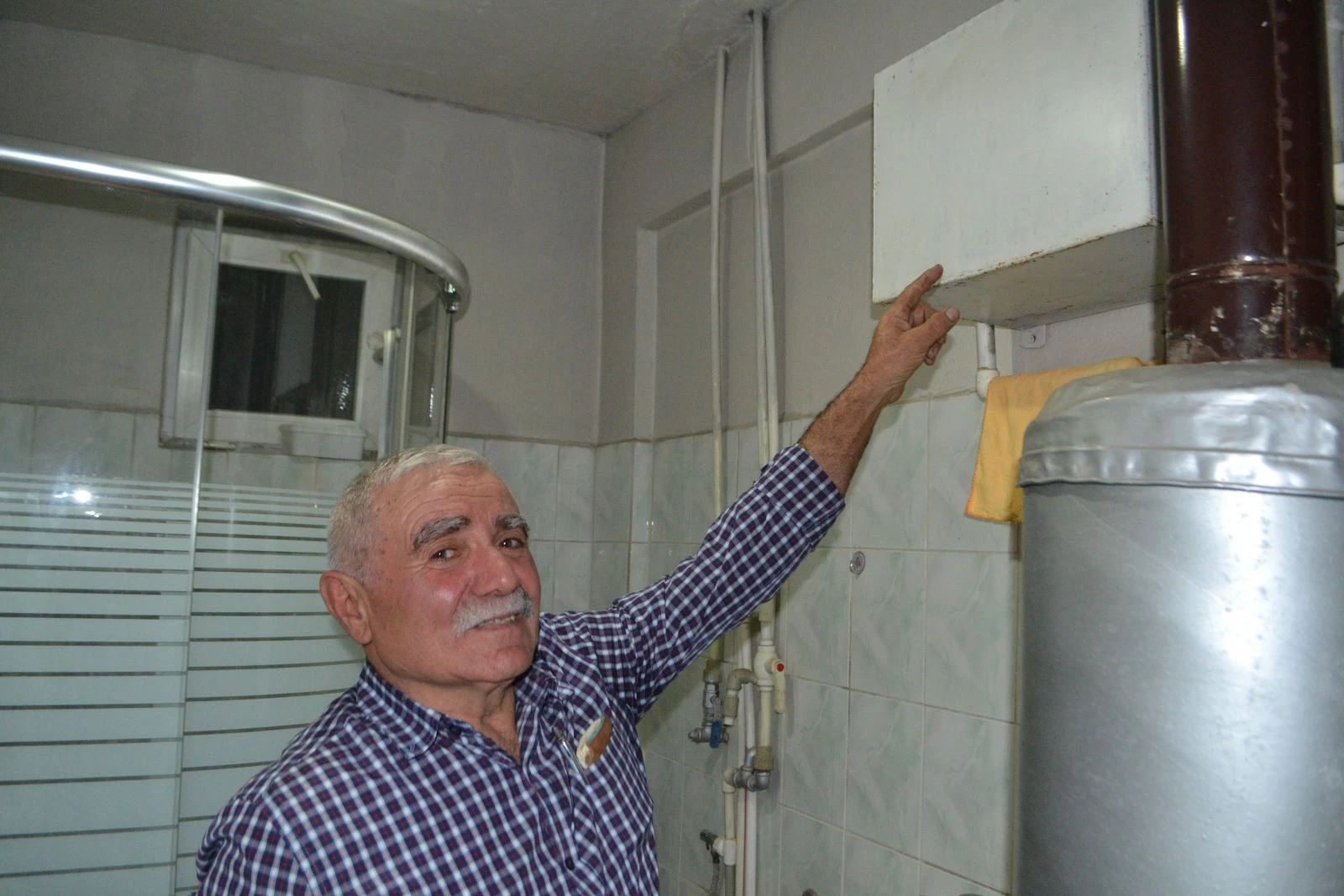 Emekli öğretmen sobayı kombiye çevirdi