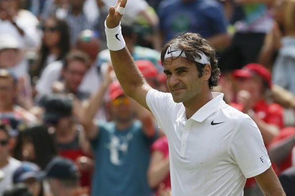 Federer güle oynaya turu geçti