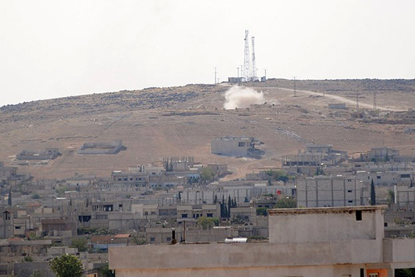 IŞİD Kobani&#039;yi üç yönden kuşattı