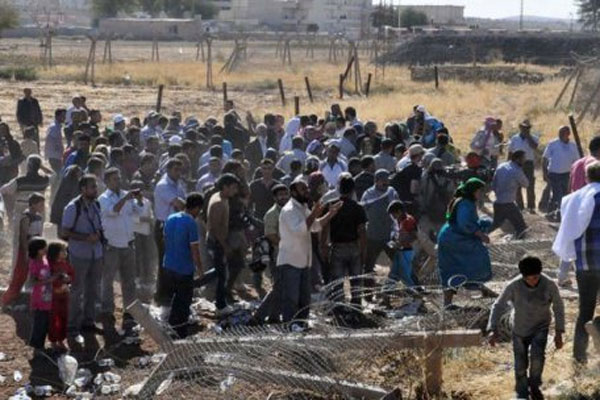 Sınır tellerini yıkıp Kobani&#039;ye geçtiler