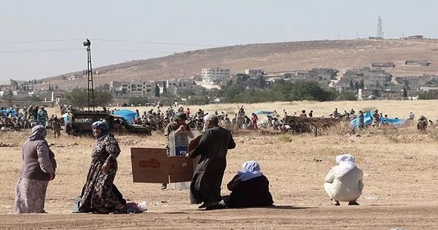 Kobani'den aralıklarla silah sesleri duyuluyor