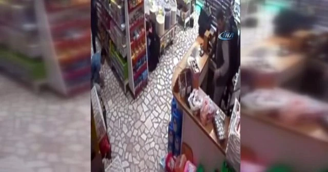Silahlı soygun sırasında çocuklarını böyle korudu