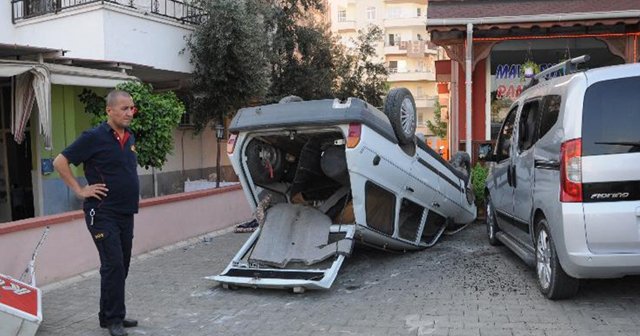 Takla atan otomobilden kurtuldu