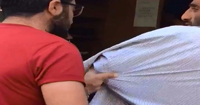 Kolunu sakladı cami önünde diledi