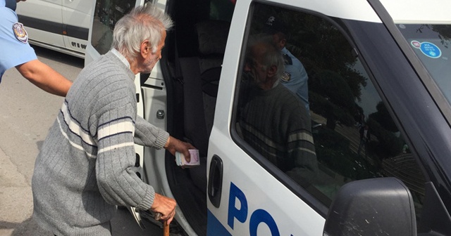 Elinde bir tomar parayla gezen yaşlı adam polisi alarma geçirdi