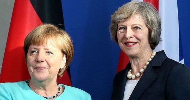 May ve Merkel telefonda İran&#039;daki nükleer anlaşmayı görüştü