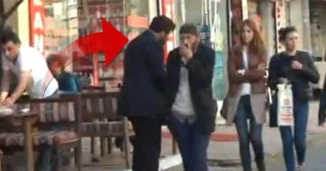 Vatandaşlara elindeki kağıdı gösteriyordu, yakalanınca yırtmaya çalıştı!