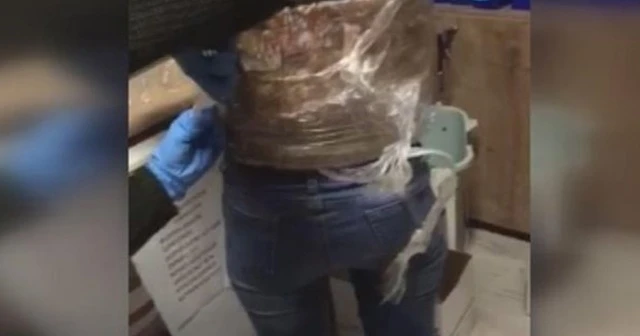 Vücuduna sarılı halde yakalandı