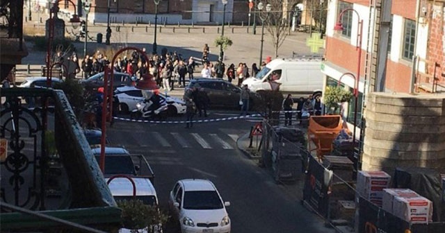 Brüksel&#039;de polis silahlı kişilerin bulunduğu binayı kordon altına aldı