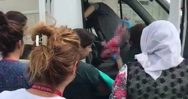 Hamile kadın hastane önünde araçta doğum yaptı