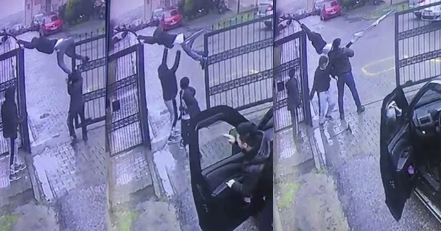 Demir kapının üstünden atlamaya çalışan çocuk korkuttu