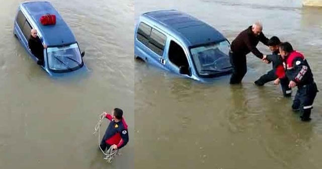 Sele kapılan araçta mahsur kalan sürücüyü itfaiye kurtardı