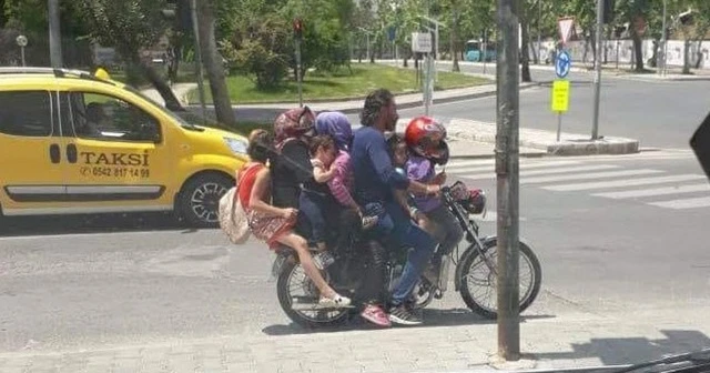 7 kişi bir motosiklette