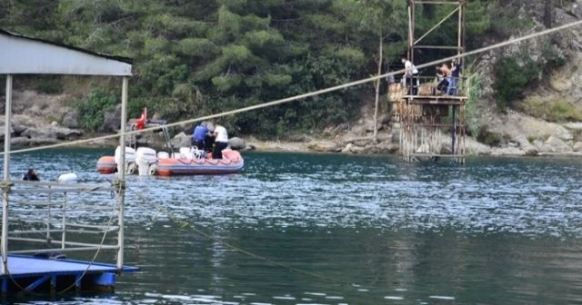 Serinlemek için göle giren genç kayboldu