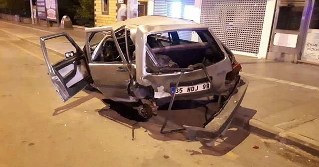 Kağıt gibi ezilen araçtan hafif yaralarla kurtuldu