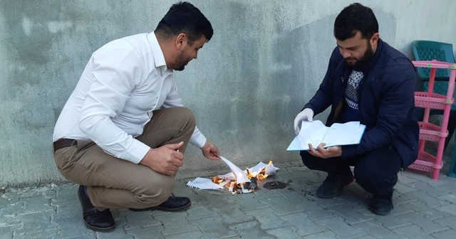 Mahallenin borcunu ödeyip veresiye defterini yaktırdı