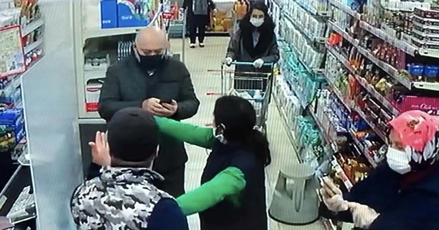 Maskesiz alışveriş yapmak isteyen kişi vatandaşlarla tartıştı
