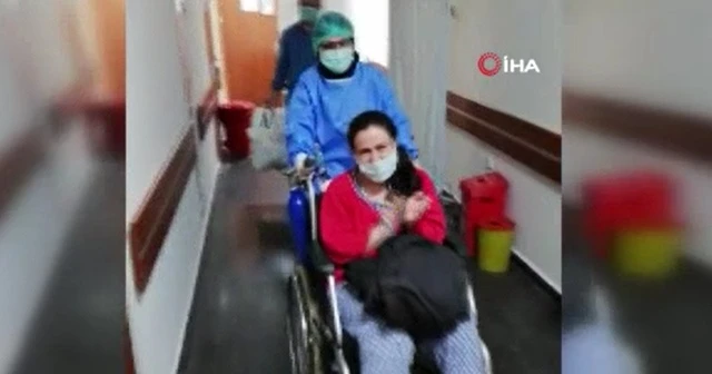 Yeni doğum yapan anne virüsü yendi, alkışlarla uğurlandı