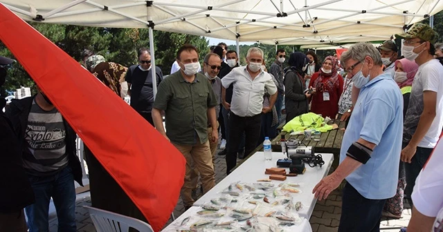 Kadın yarışmacı erkeklere taş çıkararak, en büyük balığı yakaladı