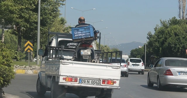 Motosiklet üzerinde ilginç yolculuk