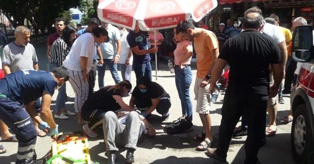 Yaralı güneşten plaj şemsiyesiyle korundu