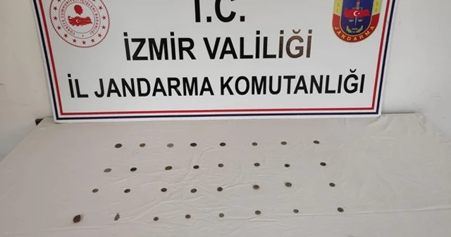 Tarihi paraları satamadan yakalandı