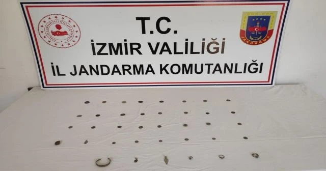 Tarihi paraları satamadan yakalandı