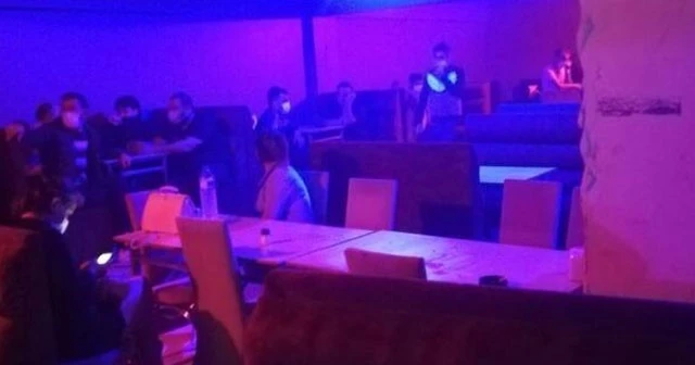 Duvardan gizli bölme açarak girmişler; 111 kişiye ceza kesildi