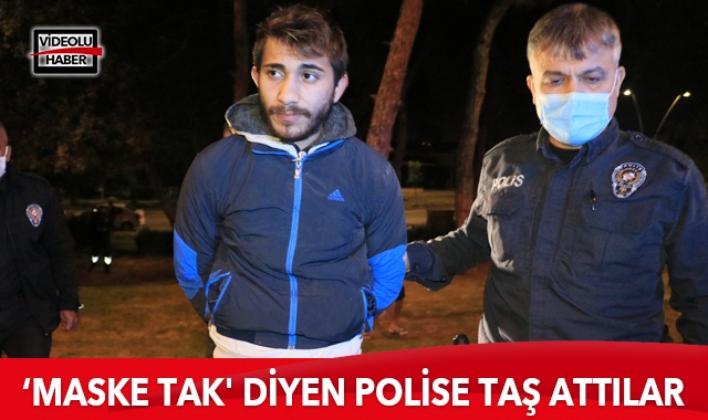 Polisin maske takmaları için uyardığı şahıslar taşla polise saldırdı