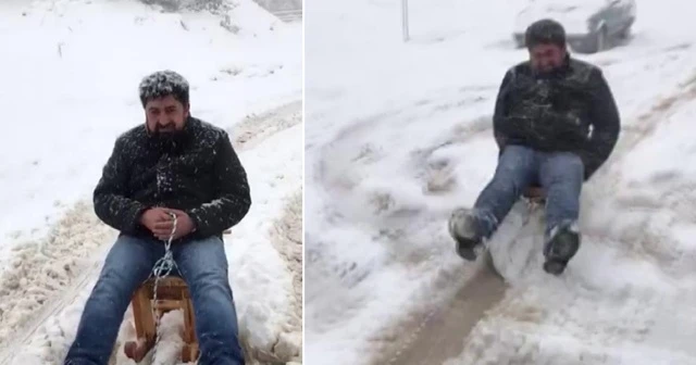 Kızağı arabanın arkasına bağladı, çocuklar gibi eğlendi
