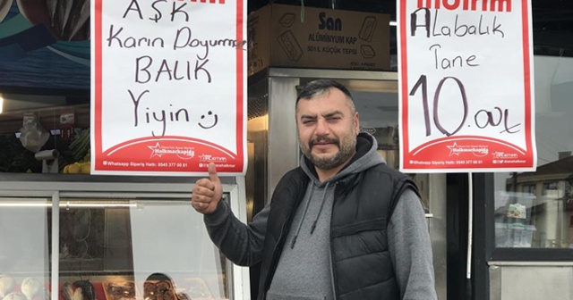 &quot;Aşk karın doyurmaz balık yiyin&quot; sloganı görenleri gülümsetti