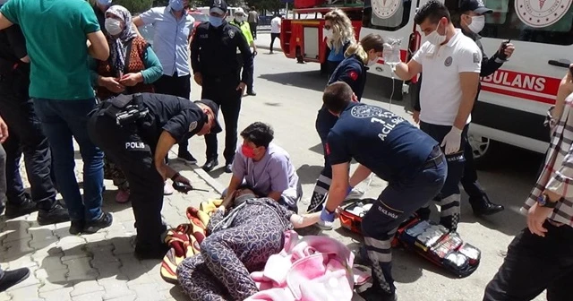 Balkondan atlayan kadını komşuları battaniye açarak kurtardı