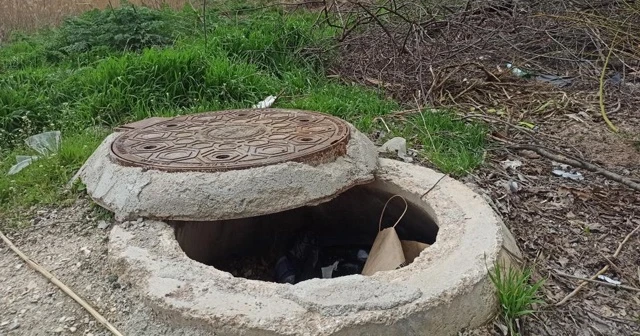 Kapağı açık bırakılan logar çöple doldu