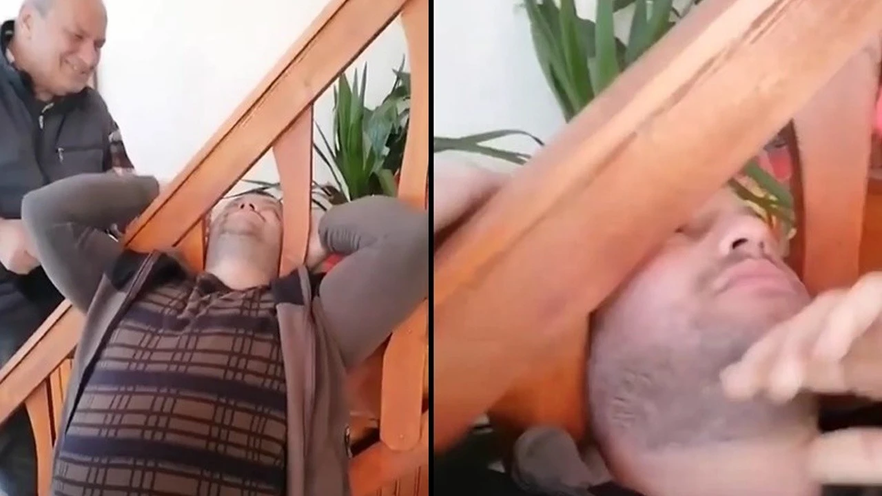 Kafası merdiven korkuluğuna sıkıştı, arkadaşları gülme krizine girdi